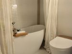Our bathroom with a soaker tub and rain shower plus a tech bidet toilet